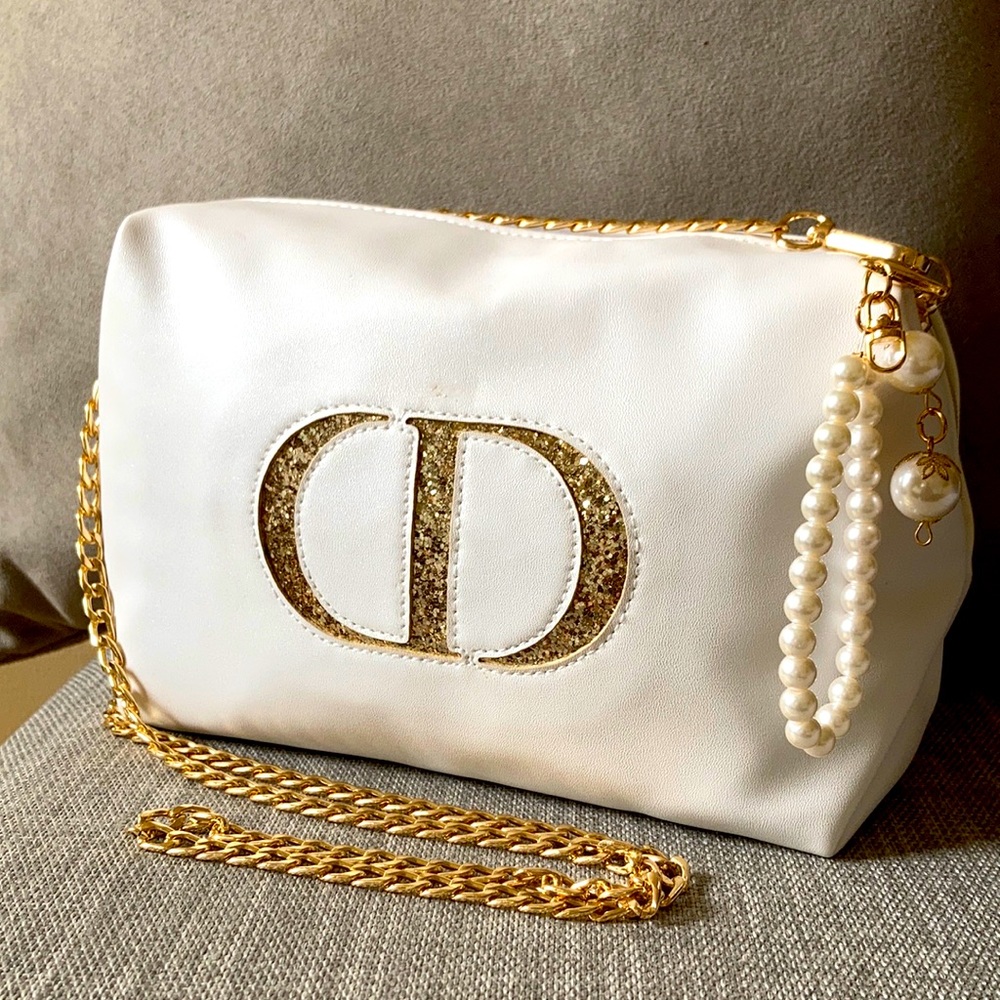 Dior white cosmetic pouch to purse
